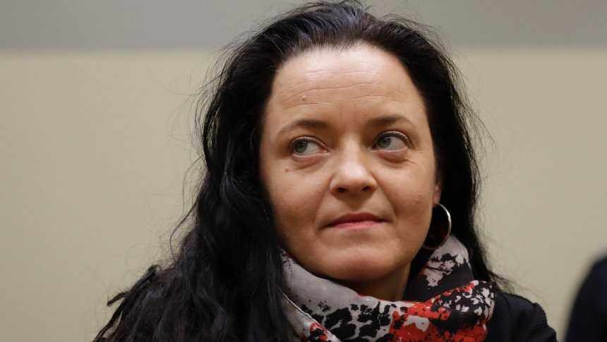 Terror suspect Beate Zschaepe sits in a court room in Munich, Germany, Wednesday, Dec. 20, 2017. German prosecutors said that Zschaepe as the main defendant in the high-profile neo-Nazi trial should receive a life sentence for her alleged role in the killing of 10 people by a group calling itself the National Socialist Underground. (AP Photo/Matthias Schrader, Pool)